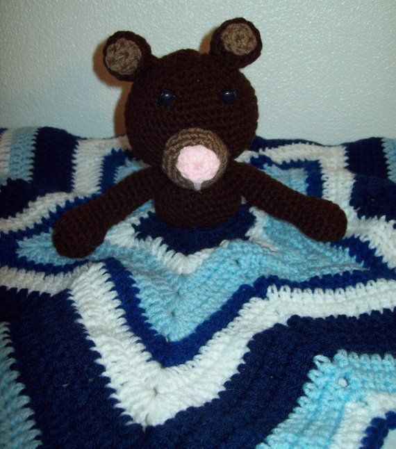 Teddy bear with blanket attached