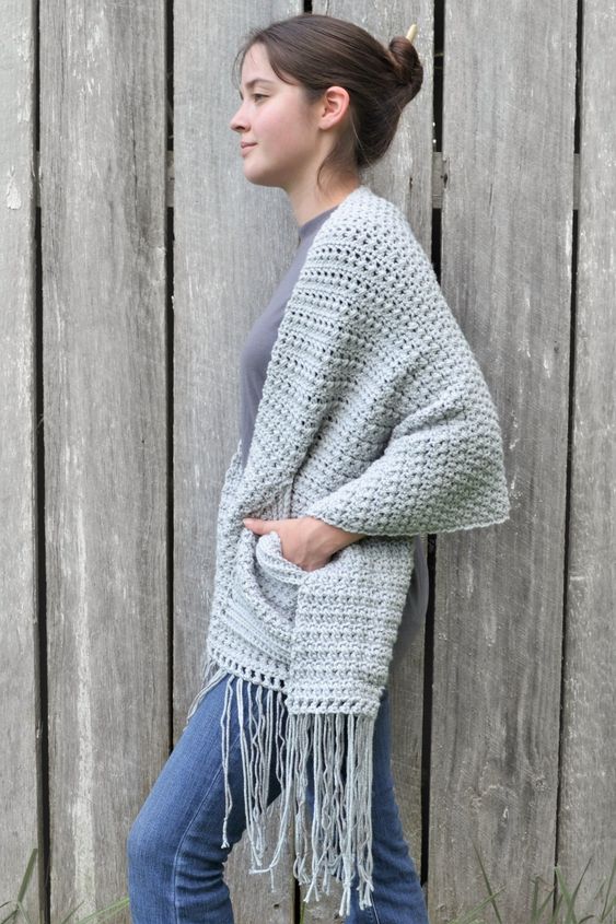 Boho crochet shawl with pockets and fringe