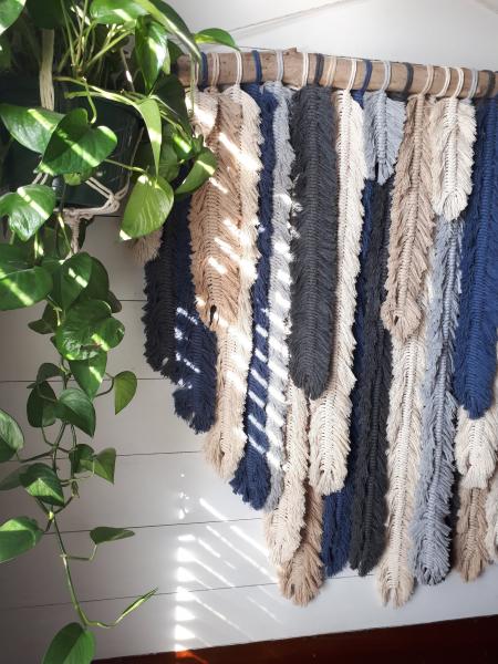 Crochet feather wall hanging