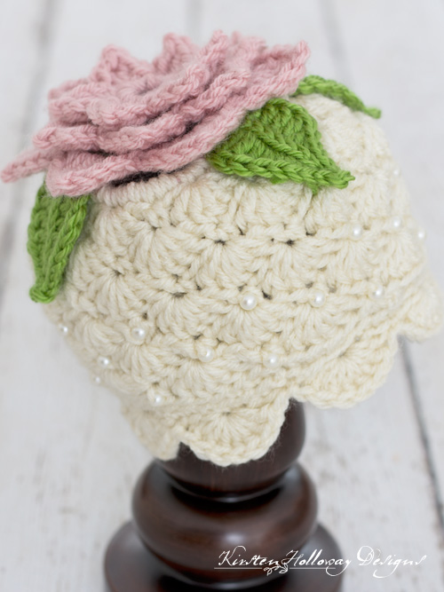 Lily Garden Crochet Hat Pattern Topped With A Flowe