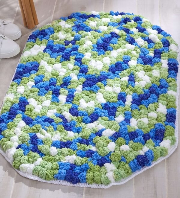 Trendy Oval Pompom Rug