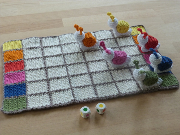 Crochet pattern for a funny family game Snail race
