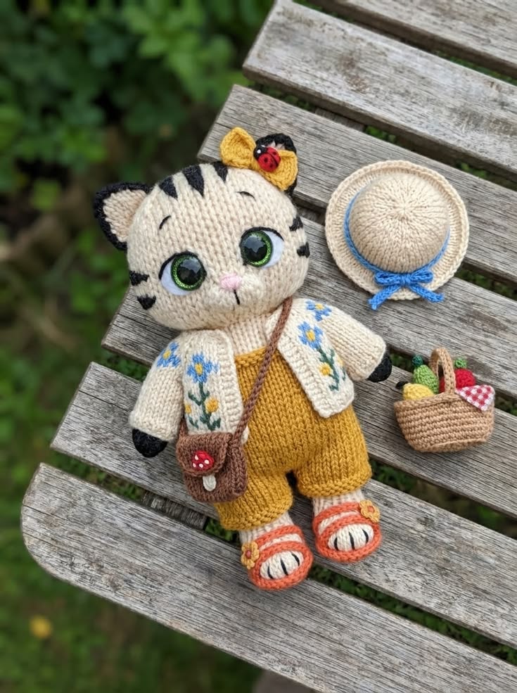 Tiger Kitten in Mustard Romper and Floral Cardigan Free Knitting Pattern