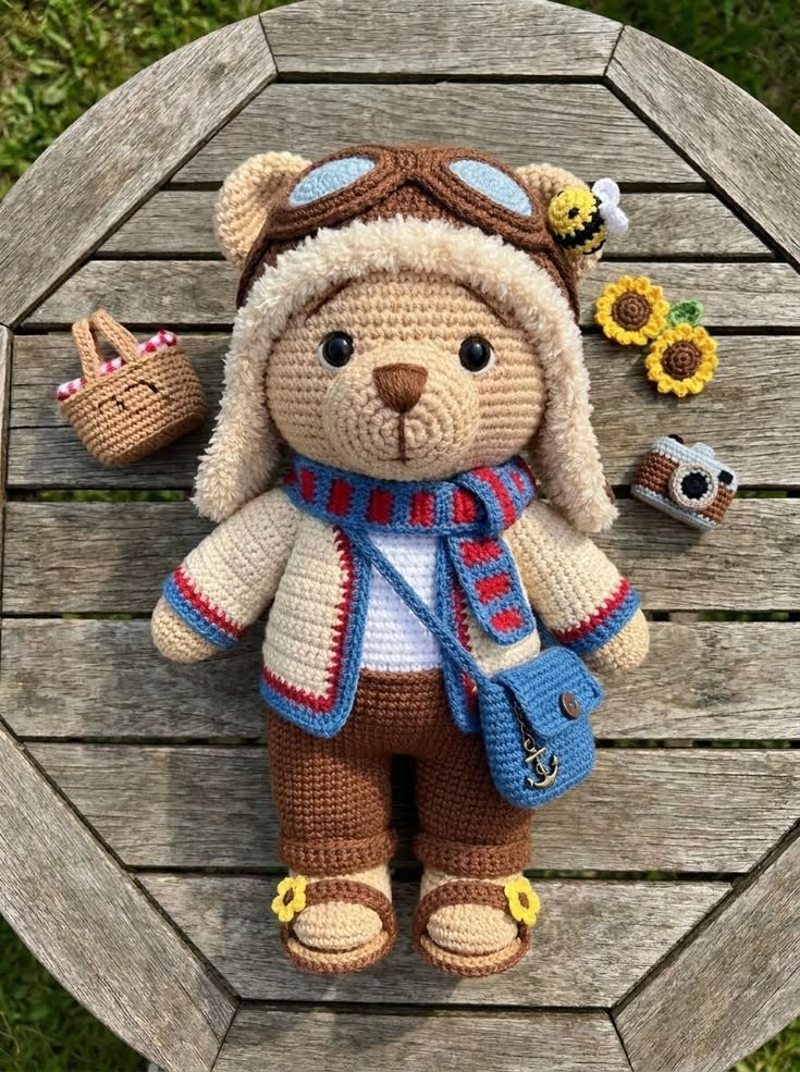 Aviator Teddy Bear in Shearling Flight Hat with Striped Scarf and Travel Accessories Free Crochet Pattern