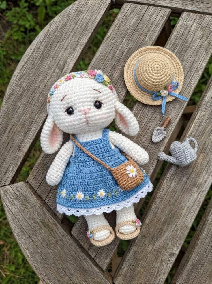 Cottage Bunny Girl in Blue Daisy Dress with Flower Satchel and Garden Tools Free Crochet Pattern