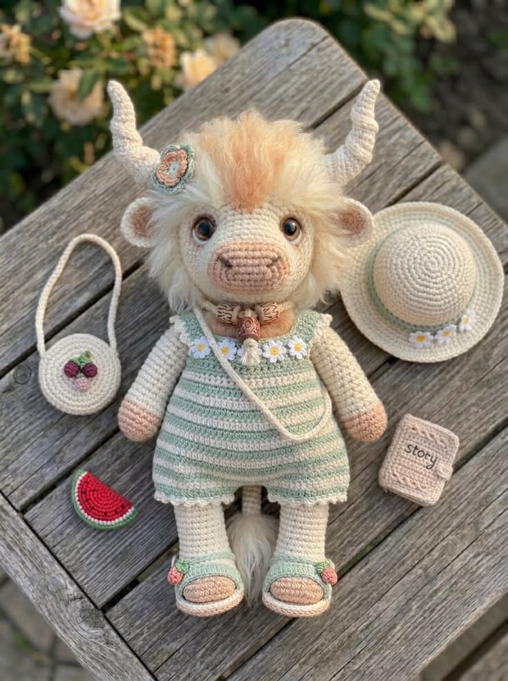 Highland Cow Girl in Mint Striped Romper with Sun Hat and Berry Bag Free Crochet Pattern
