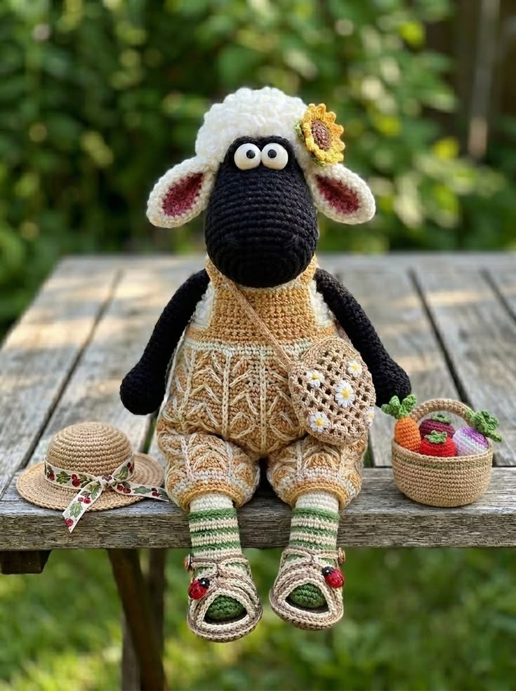 Shaun the Sheep Garden Helper in Cable Overalls with Sunflower Hair Clip and Vegetable Basket Free Crochet Pattern